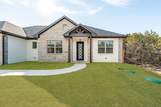 view of front facade with a front yard