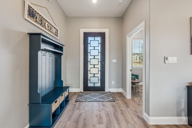 mudroom with hardwood / wood-style flooring