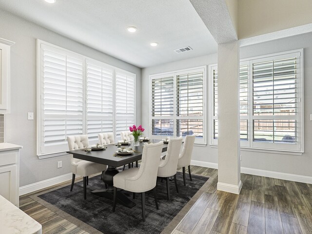 kitchen with white cabinetry, extractor fan, appliances with stainless steel finishes, and sink