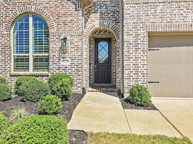 property entrance with a garage