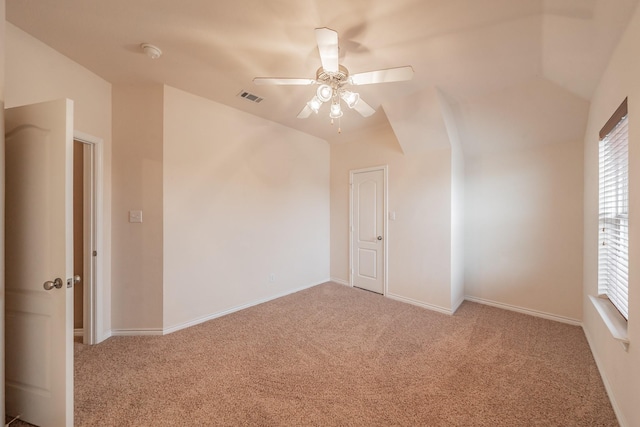 carpeted empty room with ceiling fan