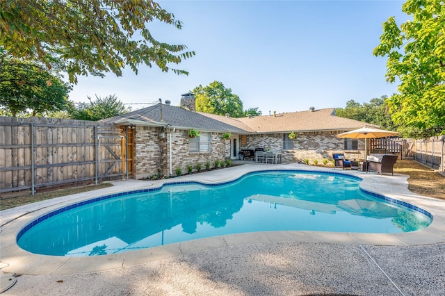 view of pool with a patio area