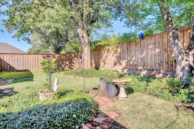 view of yard featuring a fenced backyard