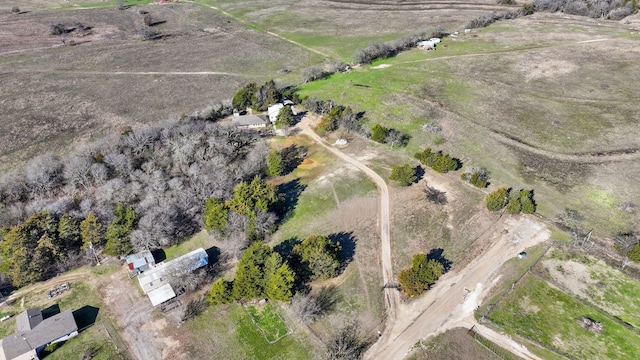 birds eye view of property featuring a rural view