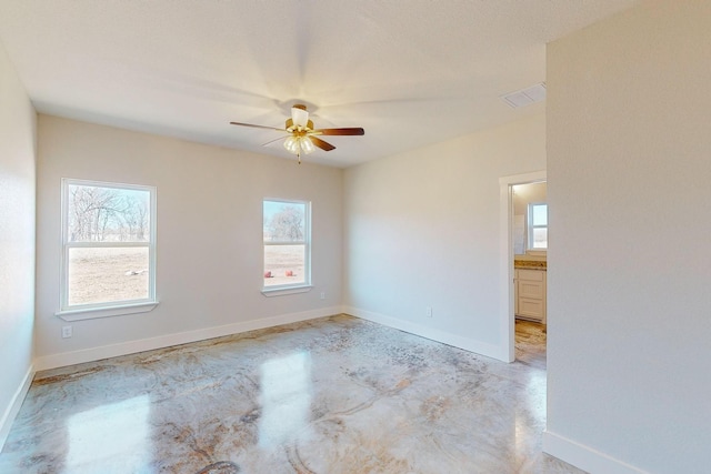 spare room featuring ceiling fan