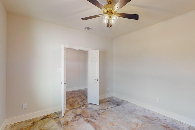 spare room with ceiling fan