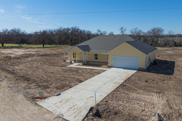 ranch-style house featuring a garage