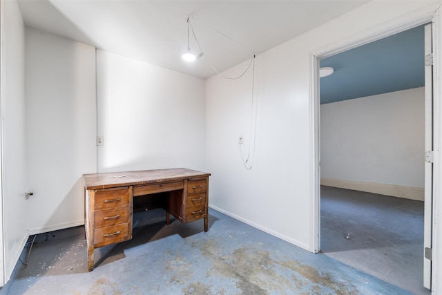 unfurnished office with concrete floors