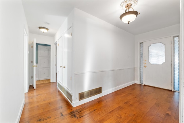 foyer with hardwood / wood-style flooring