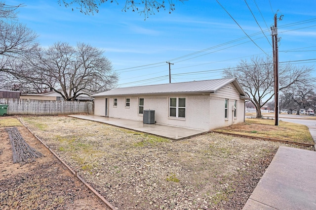 rear view of property featuring a patio