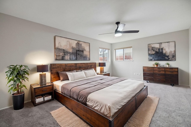 bedroom with ceiling fan and carpet flooring