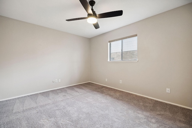 unfurnished room featuring carpet floors and ceiling fan