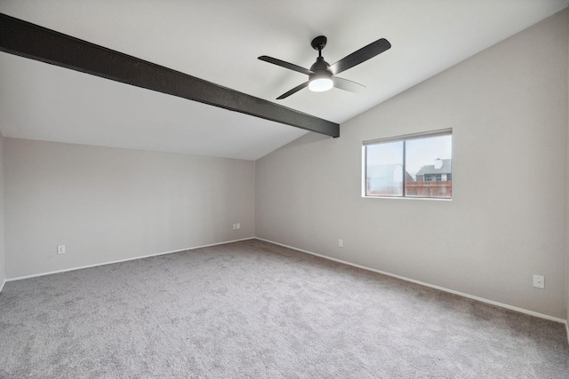 bonus room with lofted ceiling with beams, ceiling fan, and carpet