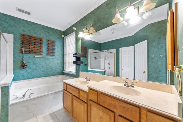 bathroom with crown molding, tile patterned floors, shower with separate bathtub, and vanity