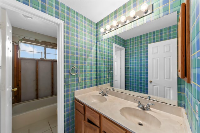 bathroom with vanity and tile patterned flooring