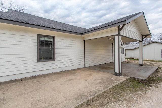 view of patio featuring a carport