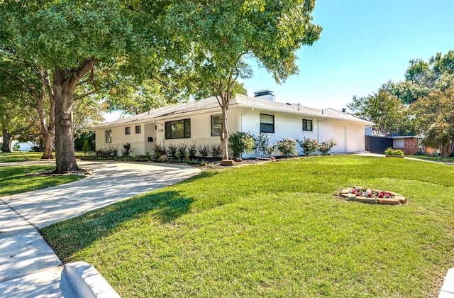 ranch-style home featuring a front yard