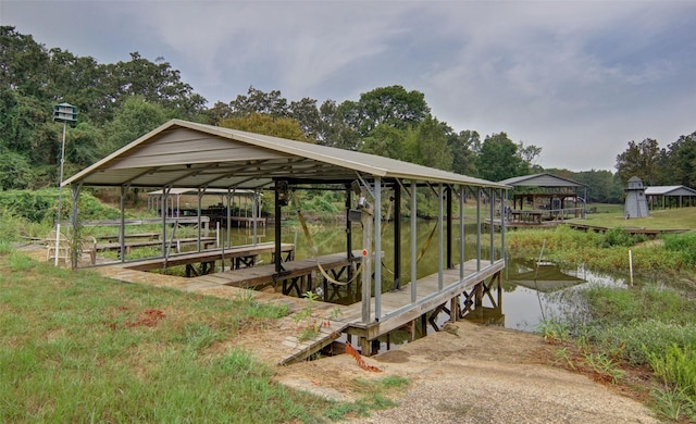 dock area featuring a water view