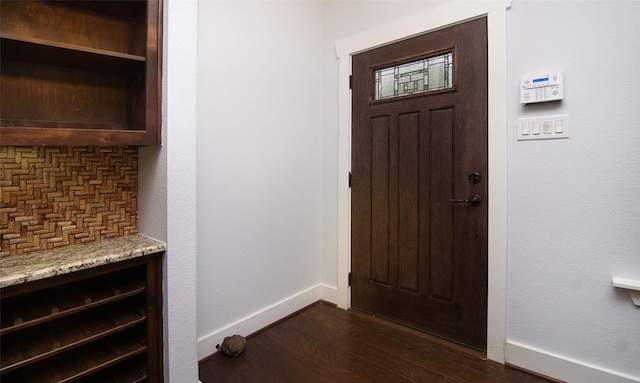 entrance foyer with dark hardwood / wood-style flooring