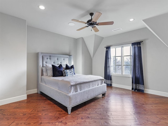 bedroom with dark wood-type flooring and ceiling fan