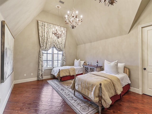 bedroom with lofted ceiling, dark hardwood / wood-style flooring, and a chandelier