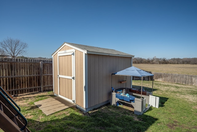 view of outdoor structure featuring a yard