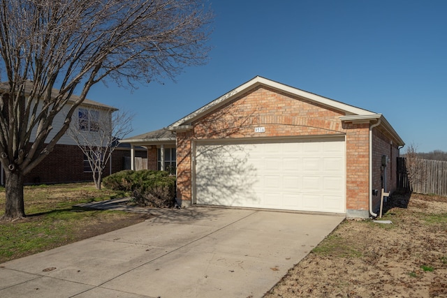 ranch-style home featuring a garage