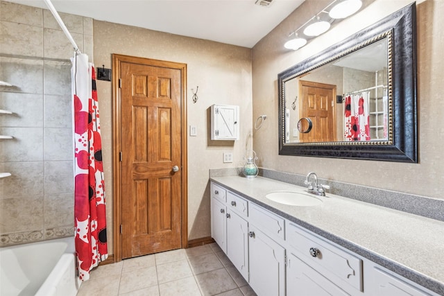 bathroom featuring vanity, tile patterned flooring, and shower / bath combo with shower curtain