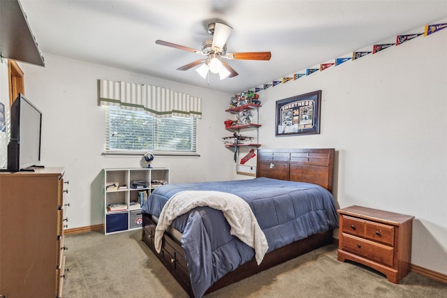 bedroom with ceiling fan and light colored carpet