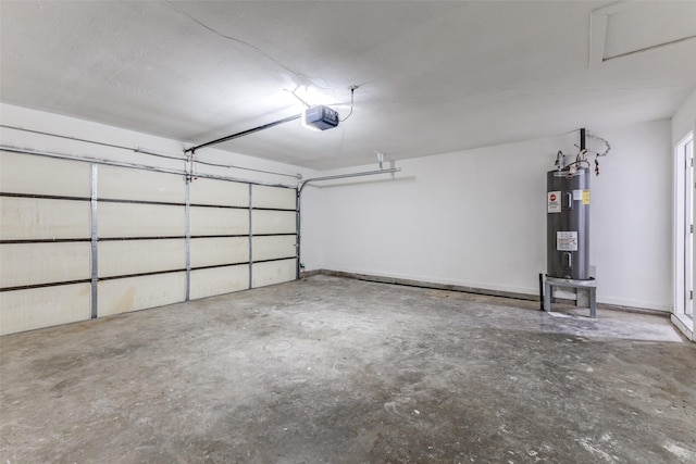 garage featuring a garage door opener and electric water heater