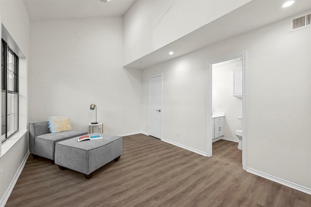 living area featuring dark hardwood / wood-style flooring