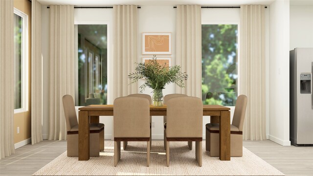 dining area with hardwood / wood-style floors