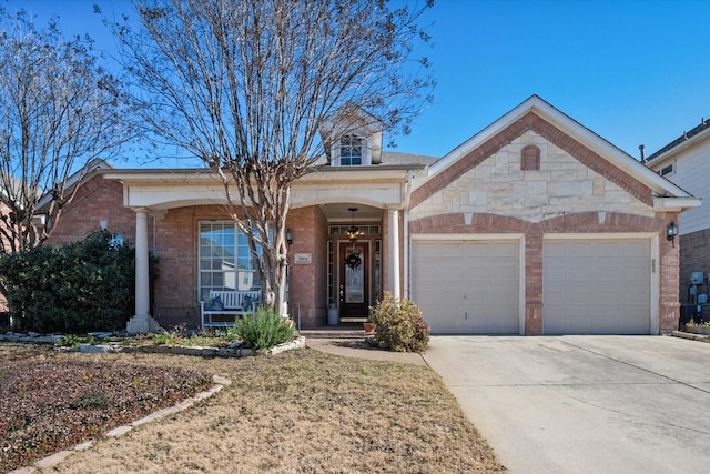 view of front of house with a porch and a garage