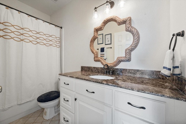 full bathroom with vanity, tile patterned floors, toilet, and shower / bathtub combination with curtain