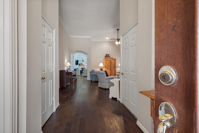 hall with crown molding and dark hardwood / wood-style floors