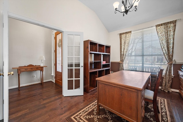 home office with lofted ceiling, an inviting chandelier, and dark hardwood / wood-style flooring