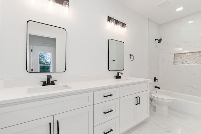 full bathroom with tiled shower / bath combo, vanity, and toilet