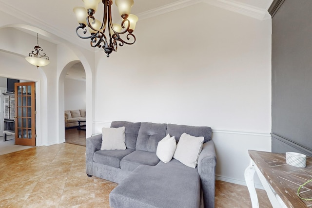 tiled living room with an inviting chandelier and crown molding