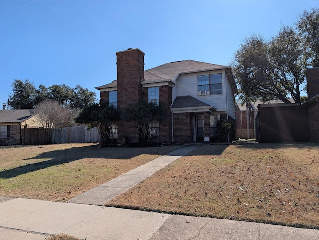 front facade with a front yard