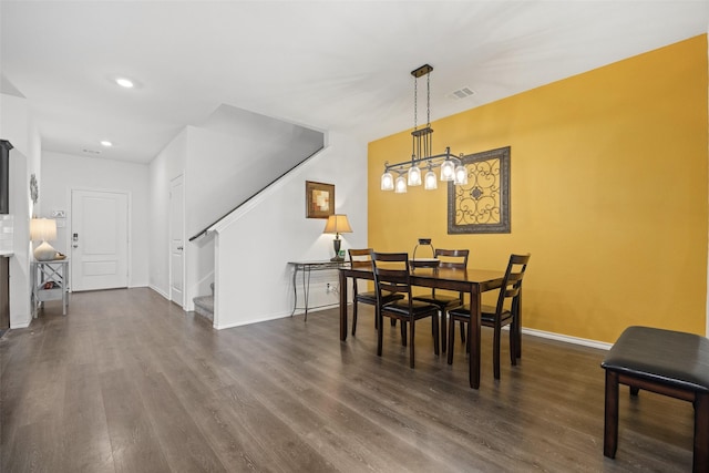 dining room featuring dark wood-type flooring