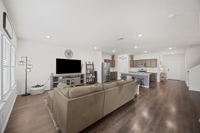 living room with dark wood-type flooring