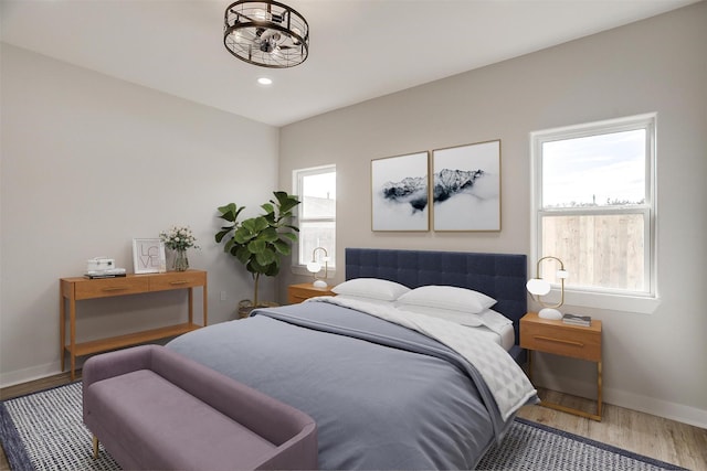 2604 Creekview Dr, Granbury, TX 76048 - bedroom with wood finished floors, baseboards, and recessed lighting