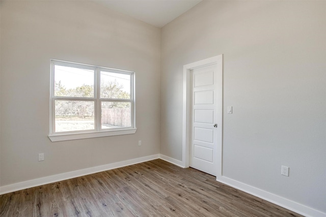 spare room featuring light hardwood / wood-style floors