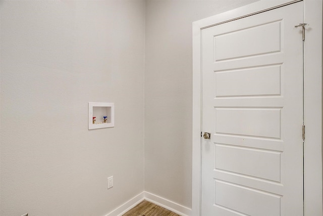 2604 Creekview Dr, Granbury, TX 76048 - laundry room with baseboards, hookup for a washing machine, and light wood finished floors
