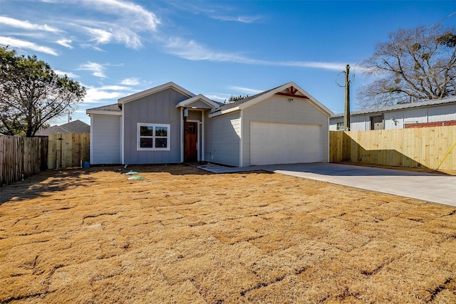 single story home with a garage