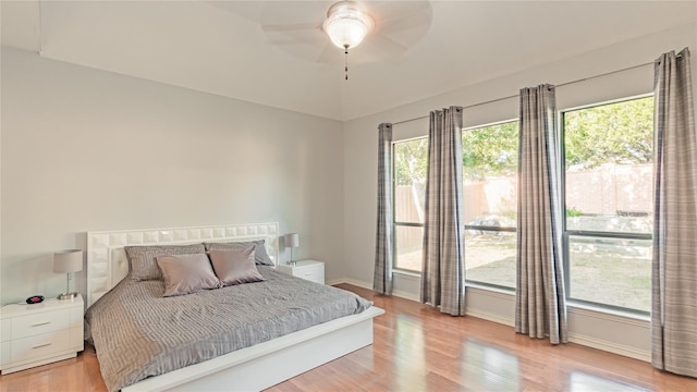 bedroom featuring ceiling fan and light hardwood / wood-style flooring