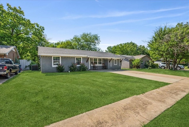 ranch-style home featuring a front yard