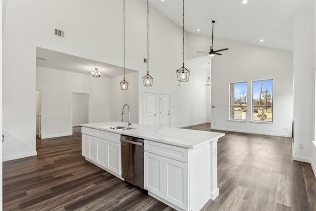 kitchen with sink, a center island with sink, dishwasher, pendant lighting, and white cabinets