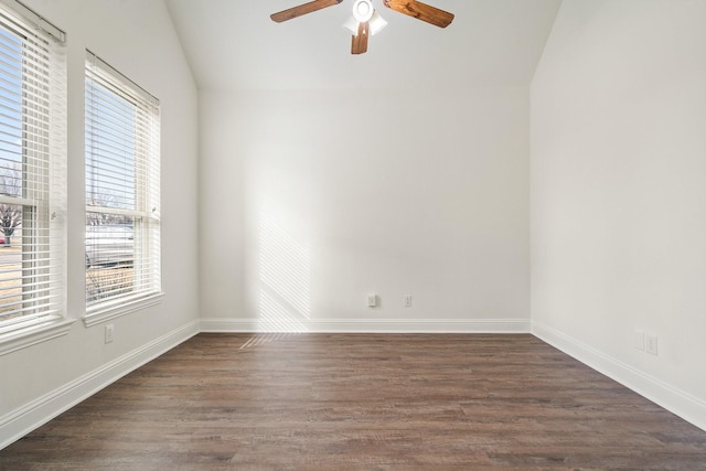 unfurnished room with ceiling fan and dark hardwood / wood-style floors