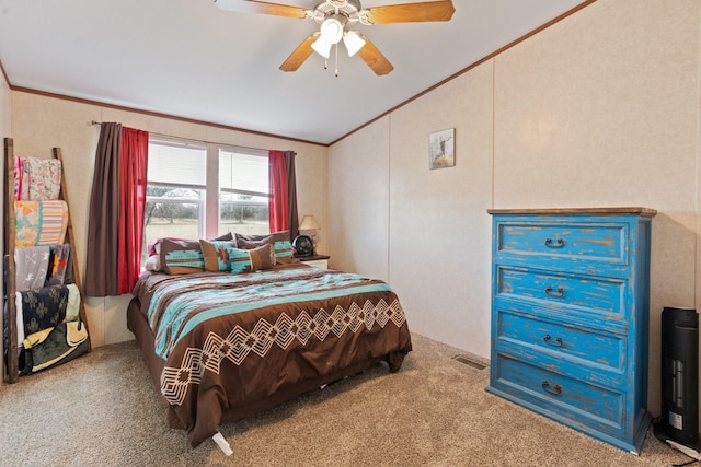 bedroom with crown molding, lofted ceiling, light carpet, and ceiling fan